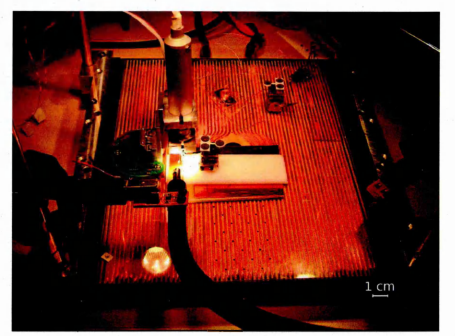 Figure 1.2: Overview of the MiCRoN set up during the integration stage. Thecamera is mounted on a Miniman robot. In the front, an infrared communication device is mounted on a USB port. 