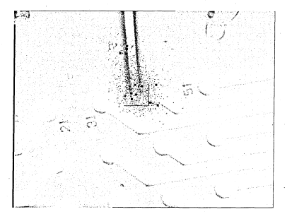 Figure 6.44: In spite of the blurred features of the pipette, its location is found. Bigblack square dots are the peak points. 